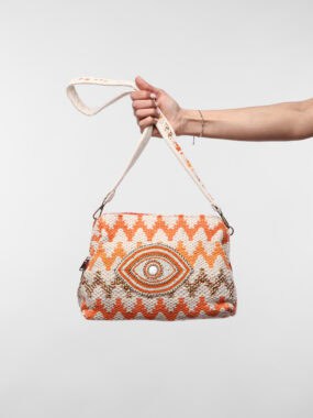 Woven embellished eye shoulder bag