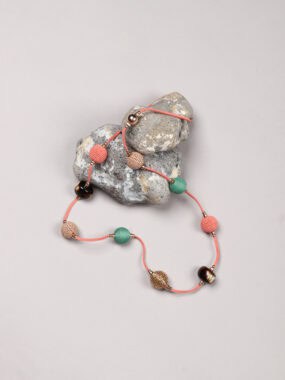 Mixed beaded necklace with faux suede chain